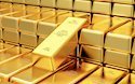 Gold resumes advance and approaches record highs