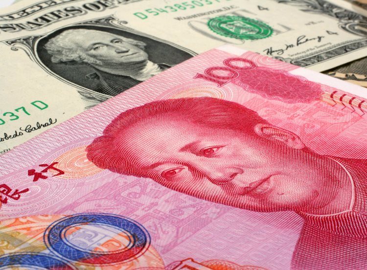 Народный банк Китая устанавливает базовый курс USD/CNY на уровне 7,1196 против предыдущего значения 7,1192