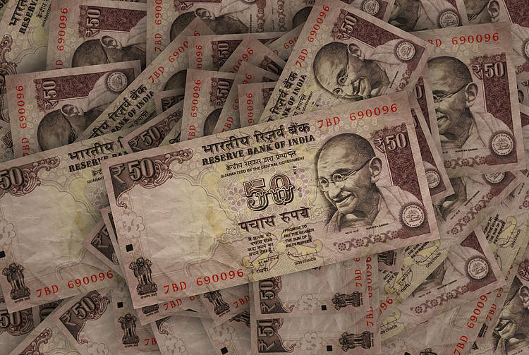 USD/INR posts modest gains, investors await the FOMC Meeting Minutes
