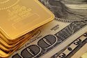 Gold reverses direction, drops below $1,860